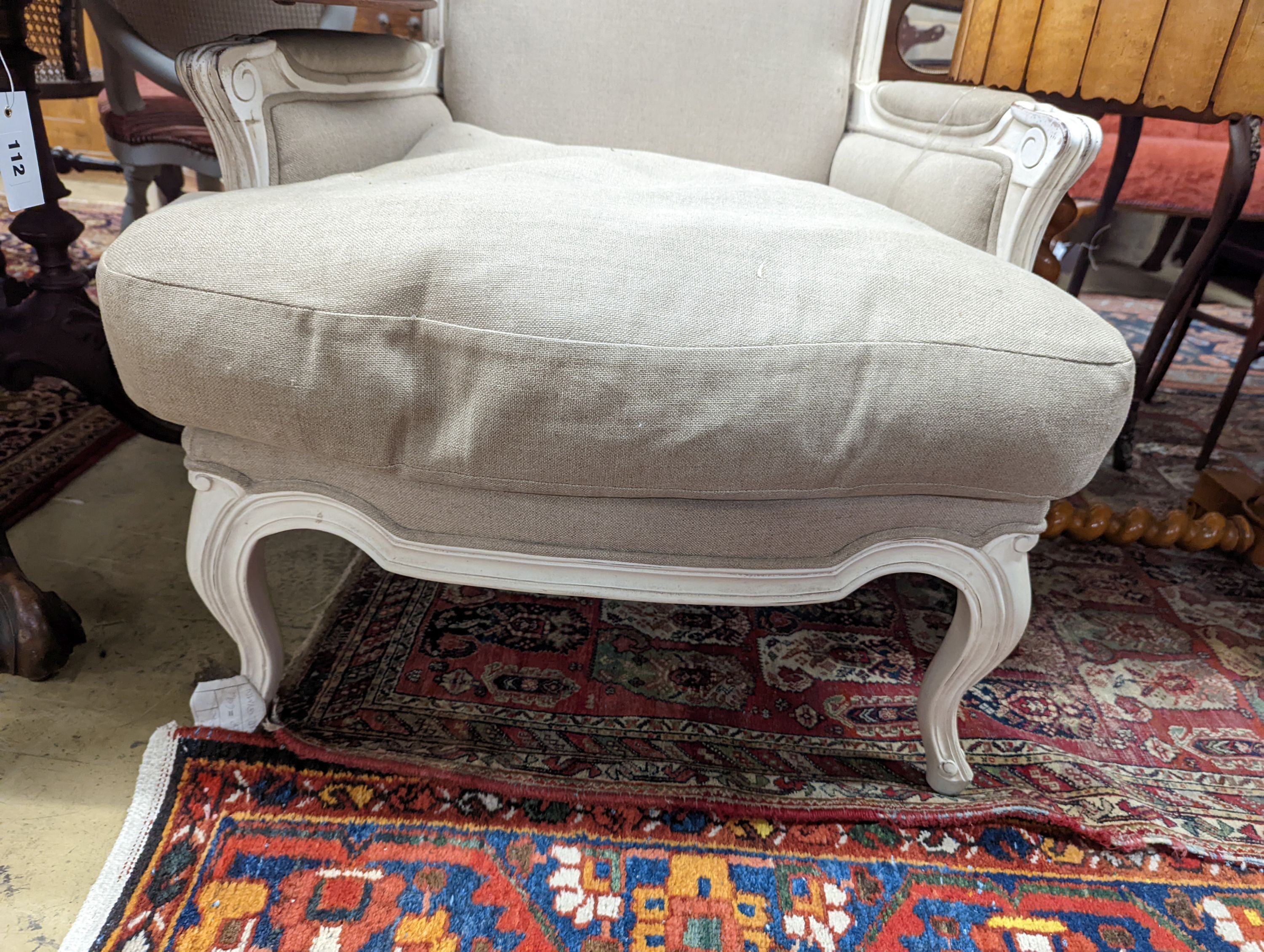 A French painted upholstered armchair, width 71cm, depth 70cm, height 94cm